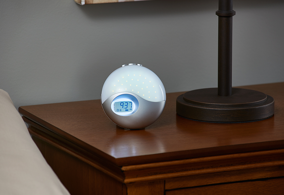 Travel Wake to Light Alarm Clock Sharper Image