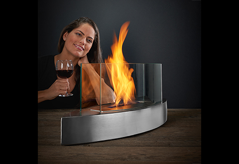 Tabletop Fireplace @ Sharper Image Dress up any table with our sophisticated Tabletop Fireplace. It gives any room a warm and cozy ambiance.